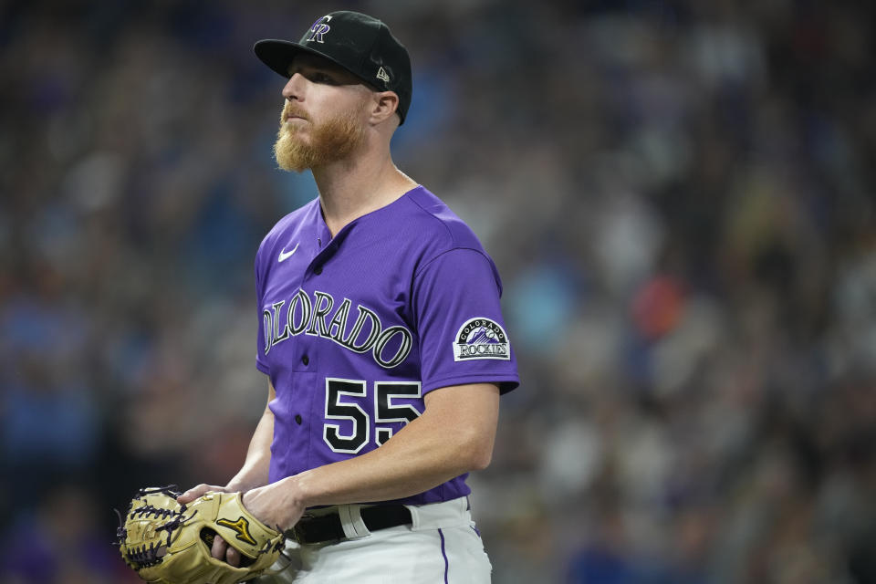 Colorado Rockies starting pitcher Jon Gray heads to the dugout after retiring Chicago Cubs' David Bote to end the top of the fifth inning of a baseball game Wednesday, Aug. 4, 2021, in Denver. (AP Photo/David Zalubowski)