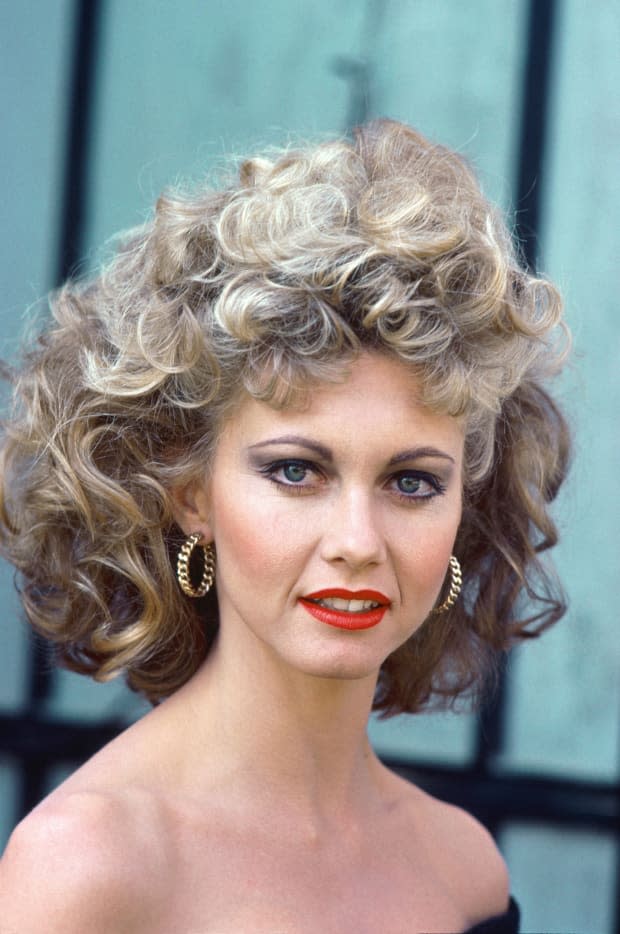 <p><strong><a href="https://parade.com/entertainment/olivia-newton-john-songs" rel="nofollow noopener" target="_blank" data-ylk="slk:Olivia Newton-John;elm:context_link;itc:0;sec:content-canvas" class="link ">Olivia Newton-John</a> </strong>starred as the original good girl gone bad, Sandy Olsson.</p><p><a href="https://www.gettyimages.com/detail/1413981567" rel="nofollow noopener" target="_blank" data-ylk="slk:Sunset Boulevard/Getty Images;elm:context_link;itc:0;sec:content-canvas" class="link ">Sunset Boulevard/Getty Images</a></p>