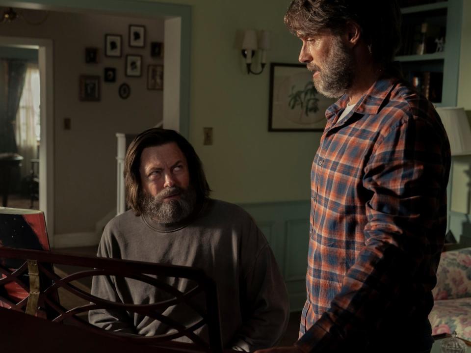 Nick Offerman sits and plays the piano while Murray Bartlett watches, in a particularly heart-wrenching scene from ‘The Last of Us' (HBO)