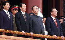 FILE - Chinese leaders, from left, then Vice President Hu Jingtao, then Premier Zhu Rongji, then President Jiang Zemin, and Li Peng, then chairman of National People's Congress celebrate the 50th anniversary of the establishment of People's Republic of China in Beijing, Oct. 1, 1999. Chinese state TV said Wednesday, Nov. 30, 2022, that Jiang has died at age 96. (AP Photo/Greg Baker, File)