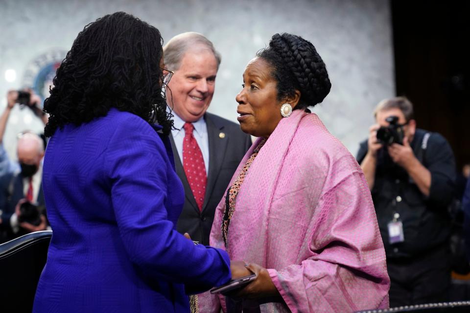Supreme Court nominee Ketanji Brown Jackson talks with Rep. Sheila Jackson Lee, D-Texas, during a break in her Senate Judiciary Committee confirmation hearing on Capitol Hill in Washington, Monday, March 21, 2022.