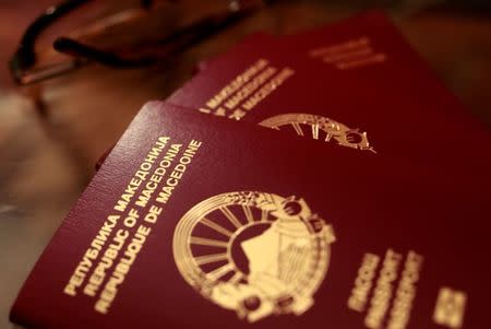 Macedonian passports are seen in Skopje, Macedonia January 12, 2018. Picture taken January 12, 2018. REUTERS/Ognen Teofilovski/Files