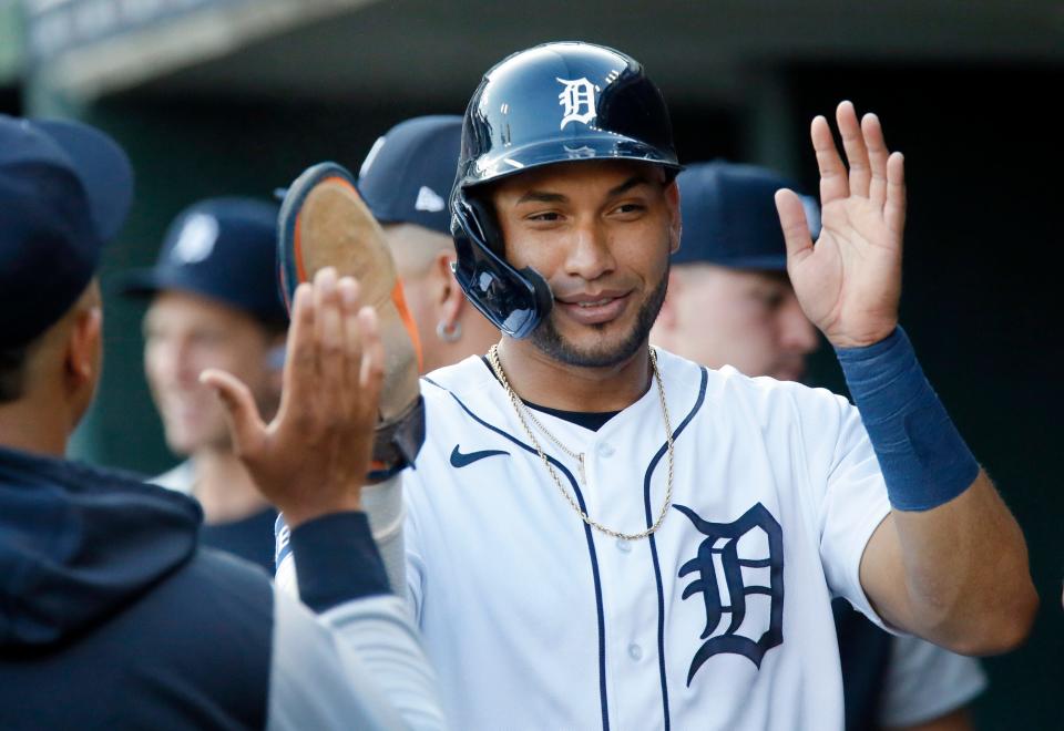 Tigers right fielder Victor Reyes is congratulated in the dugout after scoring against the White Sox during the first inning on Tuesday, June 14, 2022, at Comerica Park.