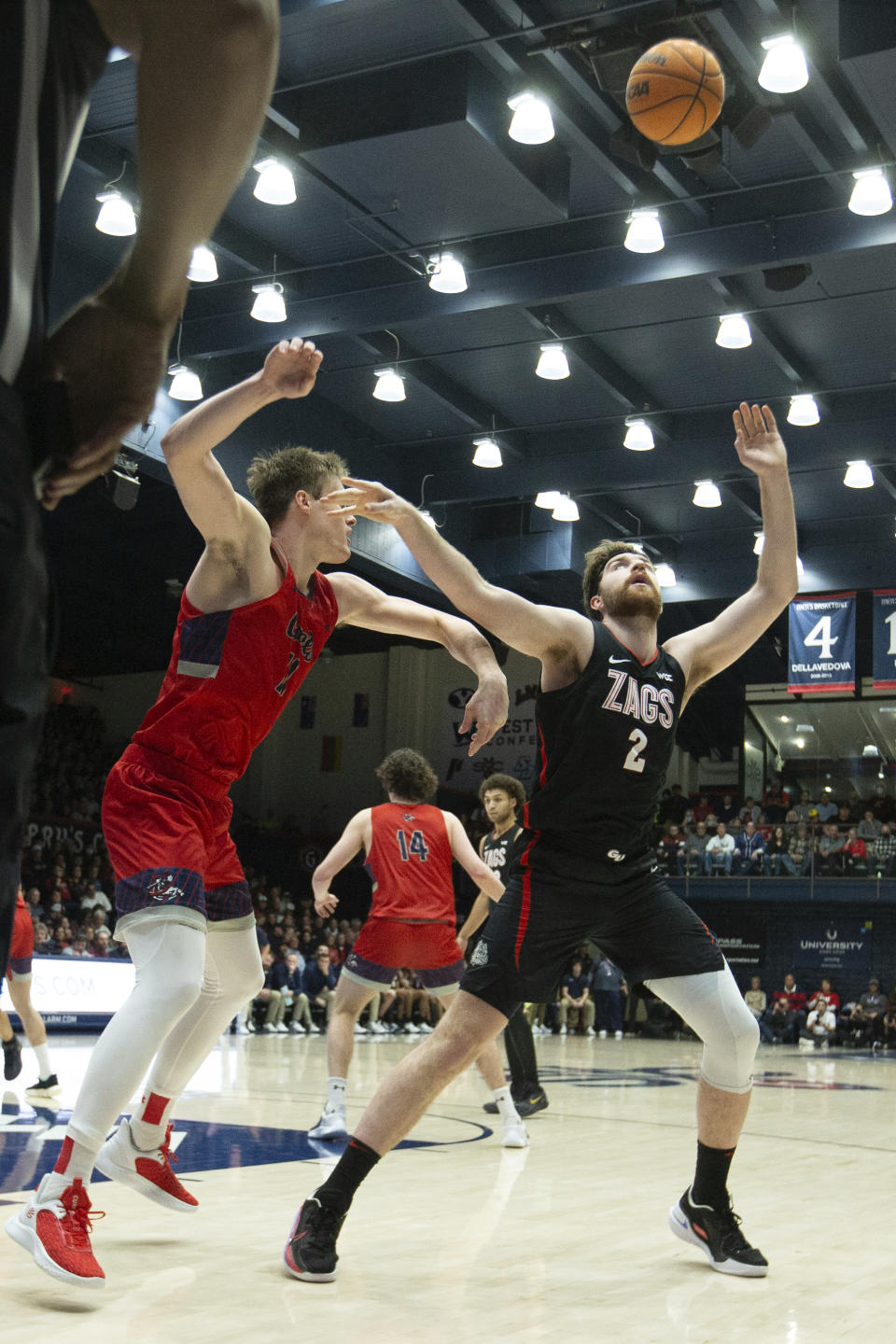 Gonzaga forward Drew Timme (2) beats Saint Mary's center Mitchell Saxen (11) to a loose ball during the first half of an NCAA college basketball game, Saturday, Feb. 4, 2023, in Moraga, Calif. (AP Photo/D. Ross Cameron)