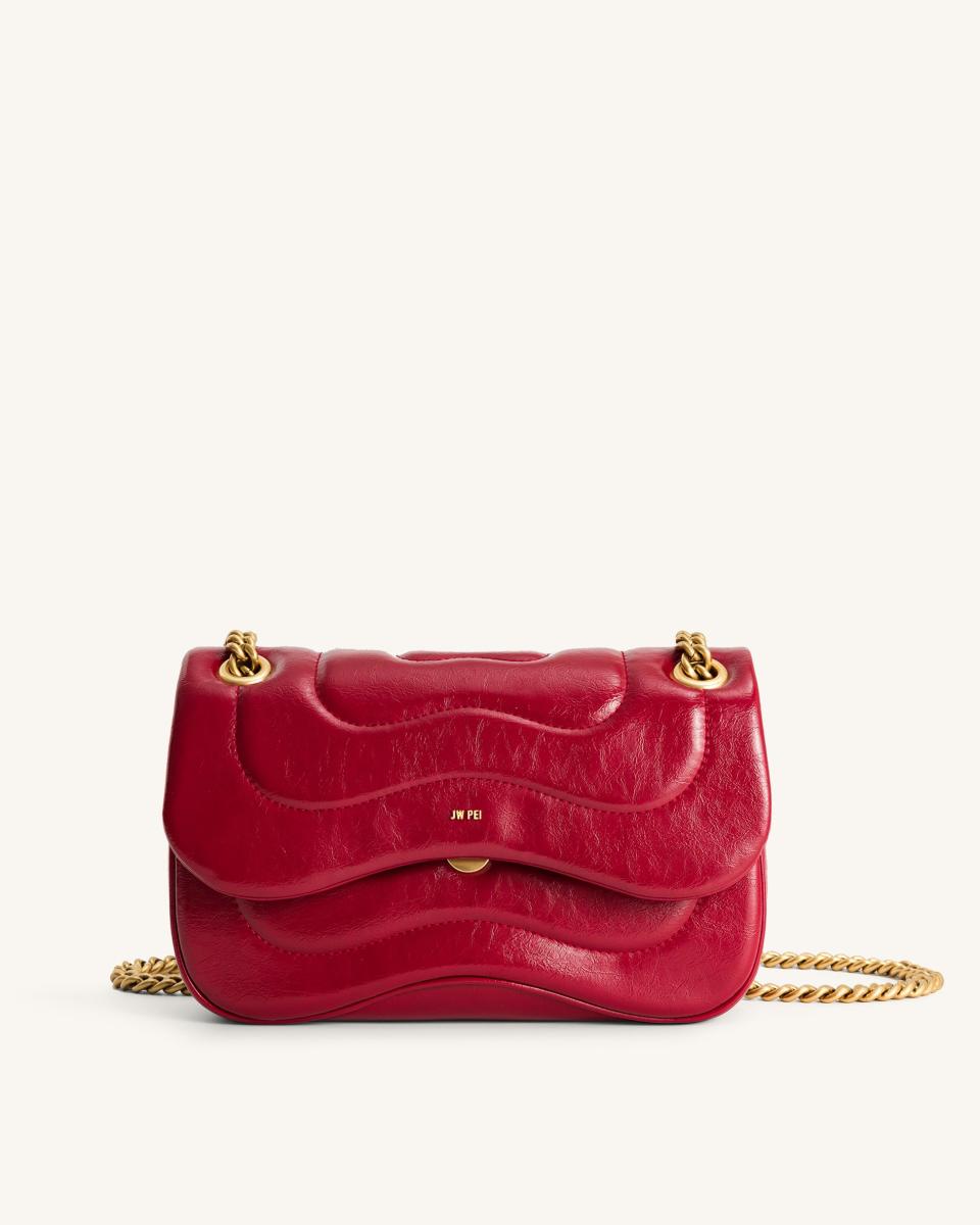 <p><a href="https://go.redirectingat.com?id=74968X1596630&url=https%3A%2F%2Fwww.jwpei.com%2Fproducts%2Ftina-quilted-chain-crossbody-claret%3Fcurrency%3DUSD%26variant%3D41084977479714%26gclid%3DCj0KCQjwib2mBhDWARIsAPZUn_mFuluUFZ8iDJydc7RlcbiNNFoSTPdGsQ8kEEZTffQqDO0KV81uEnIaAjaTEALw_wcB&sref=https%3A%2F%2Fwww.harpersbazaar.com%2Ffashion%2Ftrends%2Fg44860661%2Fbest-chain-bags%2F" rel="nofollow noopener" target="_blank" data-ylk="slk:Shop Now;elm:context_link;itc:0;sec:content-canvas" class="link ">Shop Now</a></p><p>Tina Quilted Chain Crossbody </p><p>jwpei.com</p><p>$99.00</p><span class="copyright">Tina Quilted Chain Crossbody - Claret</span>