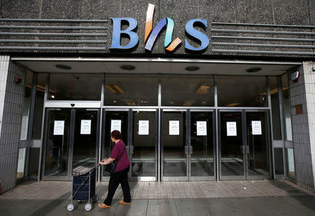 FILE PHOTO: A woman walks past the Wood Green branch of department store chain BHS, in London, August 28, 2016. REUTERS/Peter Nicholls/File Photo