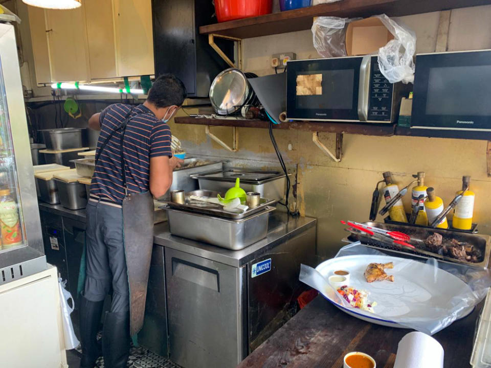 Cafe Mariam Cook preparing