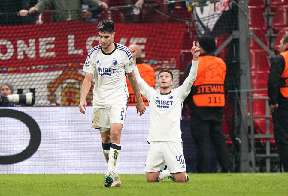 Roony Bardghji celebrates scoring against Manchester United (PA)