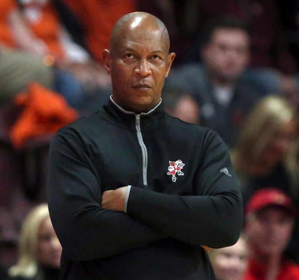 Louisville head coach Kenny Payne looks on in the first half of an NCAA college basketball game against Virginia Tech in Blacksburg, Va., Sunday, Dec. 3, 2023.