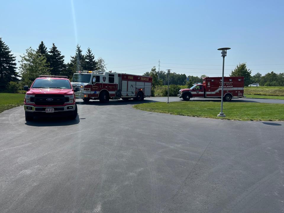 Rescue crews on scene after a man drove his vehicle off Interstate 43 and into a retention pond on the Acuity Insurance property in Sheboygan Wednesday, Aug. 23, 2023.