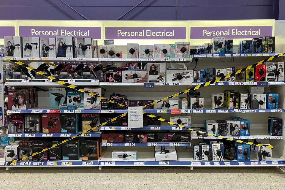 Non-essential items are sealed off in a Tesco store in Pengam Green in Cardiff, Wales: Getty Images