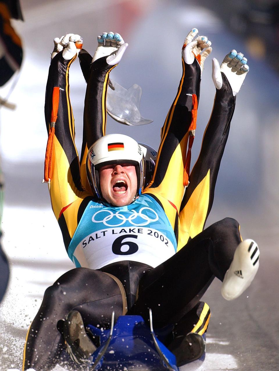 Germany’s Patric-Fritz Leitner and Alexander Resch celebrate their gold medal in the doubles luge on Feb. 15, 2002. | Jeffrey D. Allred, Deseret News