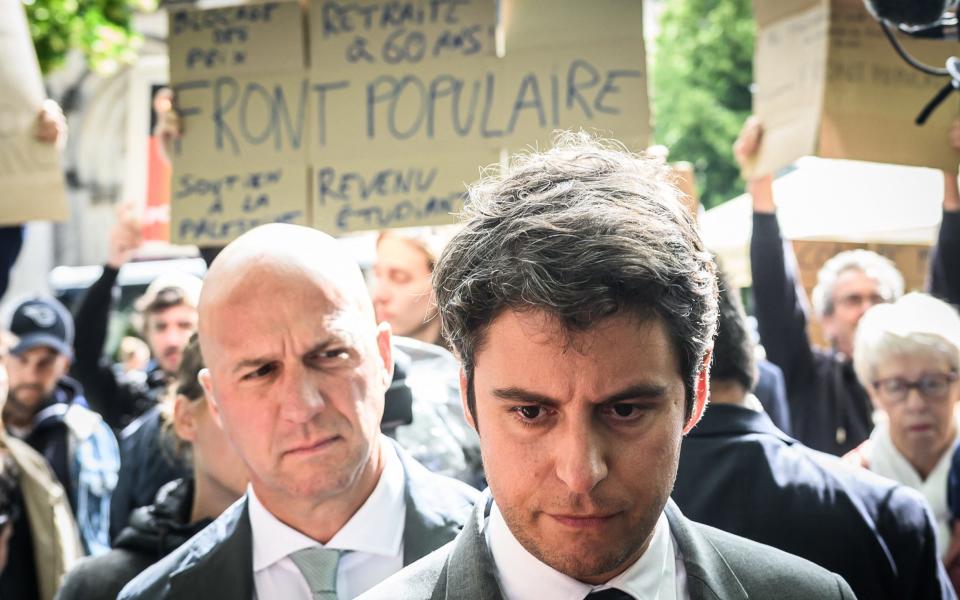 French Prime minister Gabriel Attal visits a market during a campaign trip