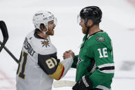 Vegas Golden Knights right wing Jonathan Marchessault (81) talks with Dallas Stars center Joe Pavelski (16) following Game 7 of an NHL hockey Stanley Cup first-round playoff series, Sunday, May 5, 2024, in Dallas. The Stars won 2-1. (AP Photo/Brandon Wade)