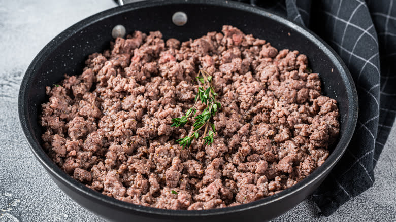 Cooked ground beef in a saute pan