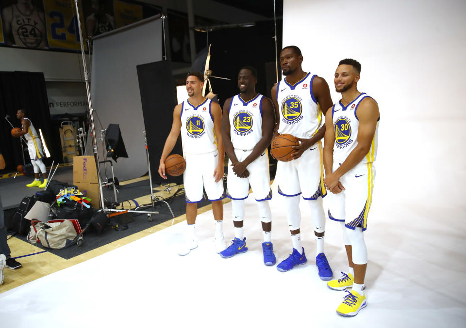 Stephen Curry、Kevin Duran、Draymond Green及Klay Thompson。(Photo by Ezra Shaw/Getty Images)