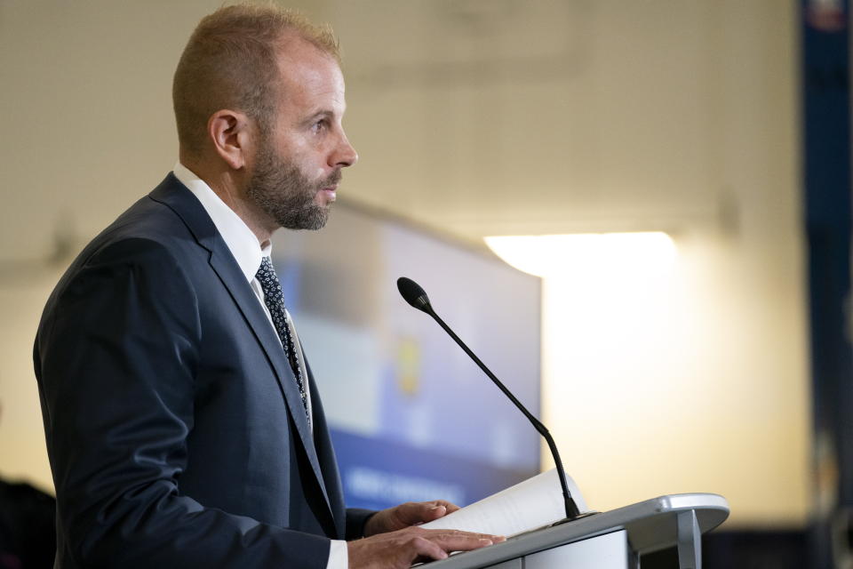 Peel Police Detective Sergeant Mike Mavity speaks to the media at a press conference regarding Project 24K a joint investigation into the theft of gold from Pearson International Airport, in Brampton, Ontario, on Wednesday, April 17, 2024. (Arlyn McAdorey/The Canadian Press via AP)