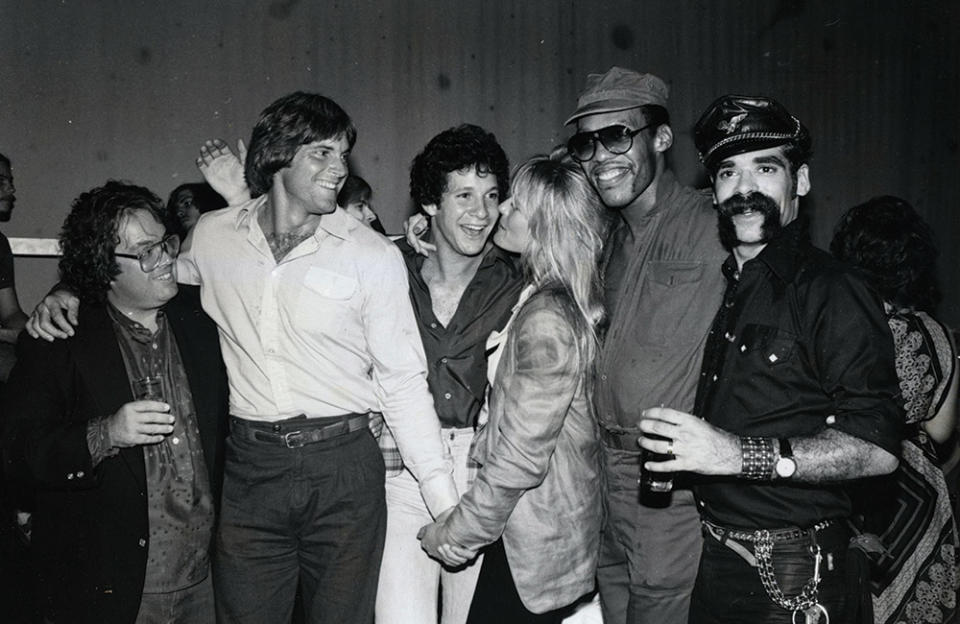 From left: Alan Carr, Caitlyn (then known as Bruce) Jenner, Steve Guttenberg, Perrine, Alex Briley and Glenn Hughes on the set of the 1980 film Can’t Stop the Music.