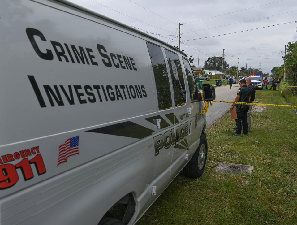 Port St. Lucie Police and crime scene investigators examine the scene of gunfire at a house in the 200 Block of Southwest Ridgecrest Drive on Thursday, Jan. 18, 2024.
