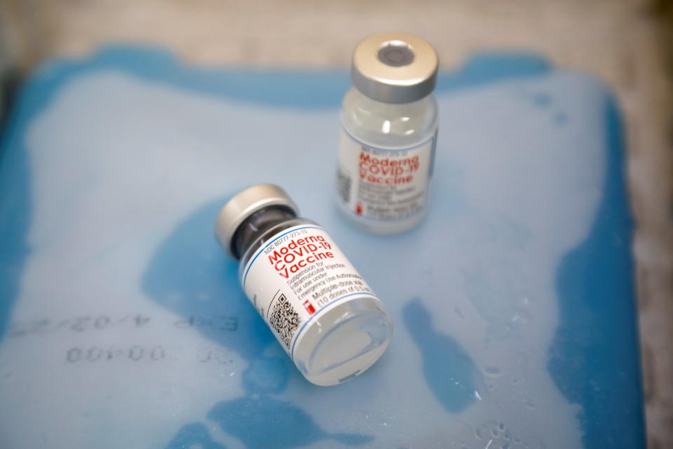 Vials containing Moderna vaccines are pictured during the administration of a third shot of coronavirus disease (COVID-19) vaccine, in Jenin, the Israeli-occupied West Bank, September 15, 2021. REUTERS/Raneen Sawafta