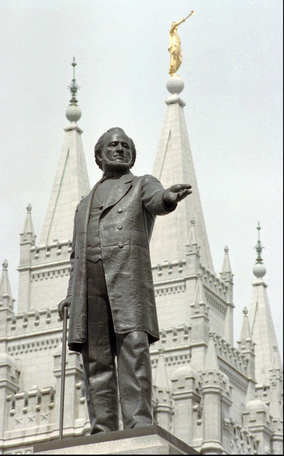 FILE - In this April 1, 1998 file photo, a statue of Mormon pioneer leader Brigham Young stands in front of The Church of Jesus Christ of Latter-day Saints' Temple in Salt Lake City. Latter-day Saints are anxious about whats ahead. Republican Mitt Romney is about to become the first Mormon nominee for U.S. president on a major party ticket, giving Mormons a chance like no other to explain their tradition to the public. But the churchs many critics will have a bigger platform, too. And the vetting will take place amid the emotion of what observers expect will be a nasty general election. (AP Photo/Douglas C. Pizac, File)