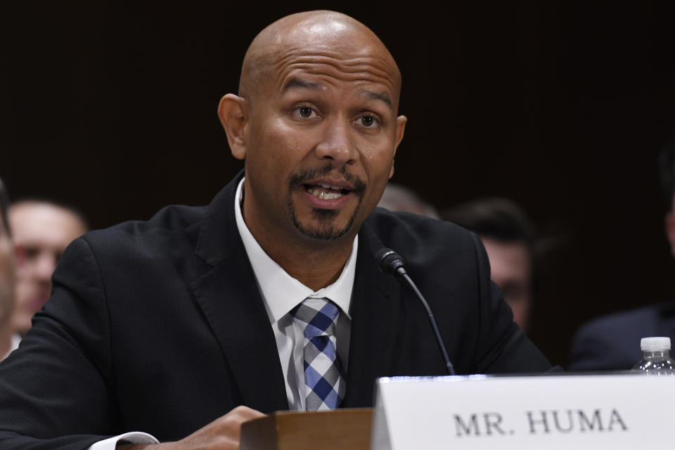 National College Players Association Executive Director Ramogi Huma testifies during a Senate Commerce subcommittee hearing on Capitol Hill in Washington, Tuesday, Feb. 11, 2020, on intercollegiate athlete compensation. (AP Photo/Susan Walsh)