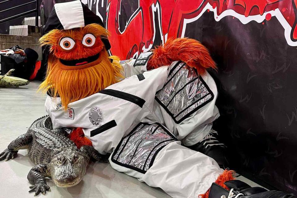 <p>Gritty/ Instagram</p> Gritty the mascot of the Philadelphia Flyers, poses with Wally the emotional support alligator
