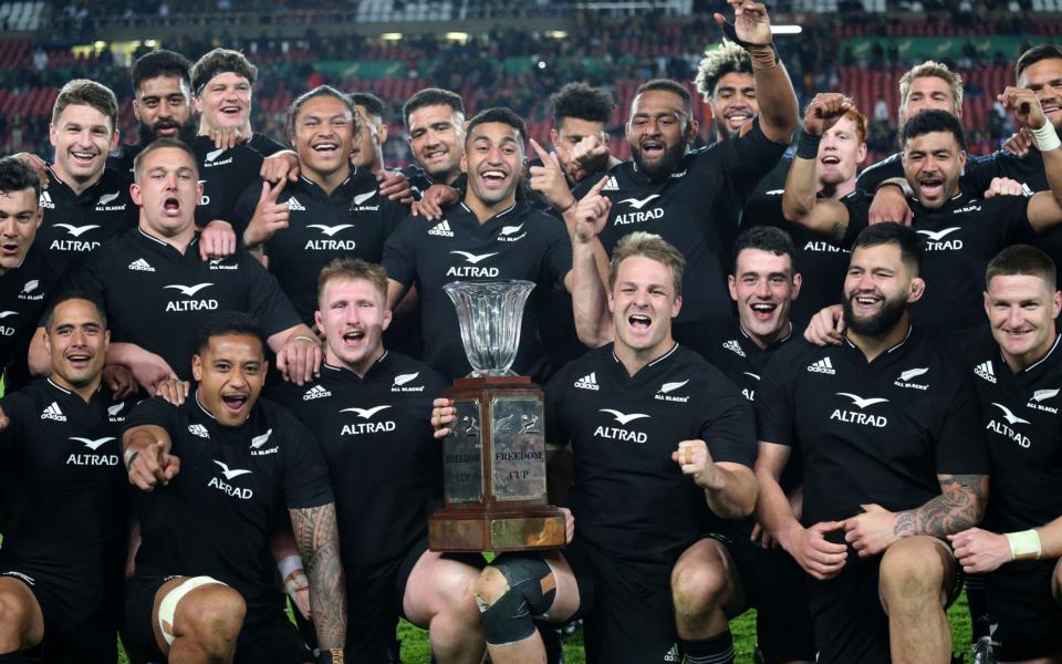 New Zealand's team captain Sam Cane (C-R) holds the Freedom Trophy after winning against South Africa in a 2022 Rugby Championship match held at the Ellis Park Stadium - KIM LUDBROOK/EPA-EFE/Shutterstock