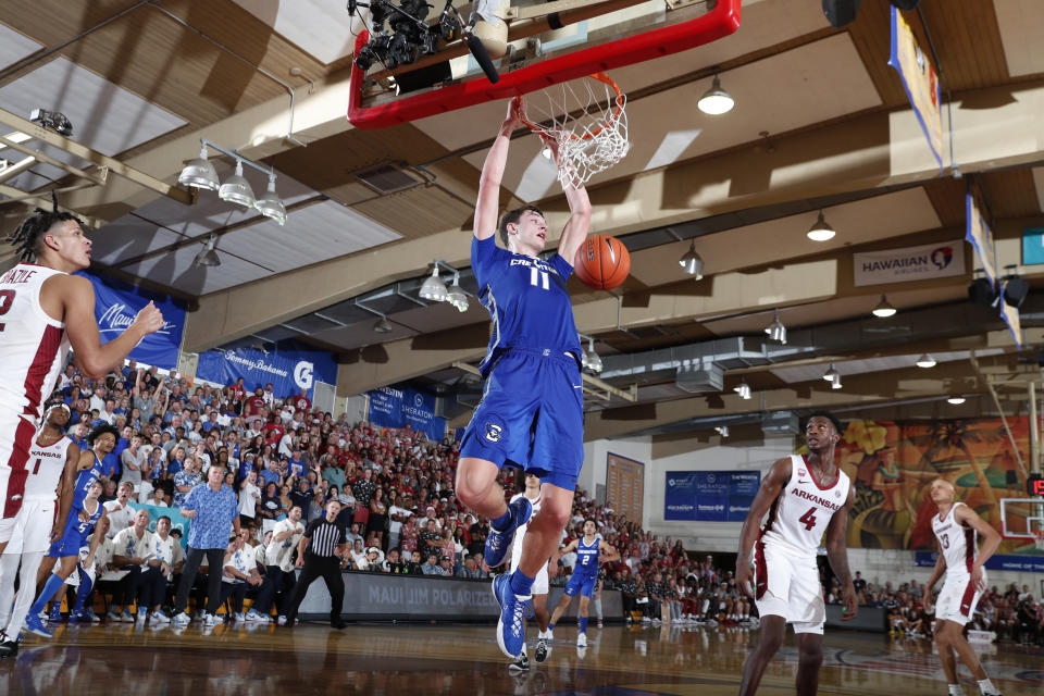 Creighton Bluejays center Ryan Kalkbrenner (11) dunks against the Arkansas Razorbacks during the second round of the Maui Invitational. (Photo by Brian Spurlock/Icon Sportswire via Getty Images)
