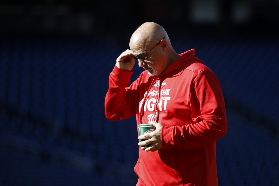 Washington Nationals general manager Mike Rizzo walks on the field during a baseball workout, Friday, Oct. 18, 2019, in Washington, in advance of the team's appearance in the World Series. (AP Photo/Patrick Semansky)