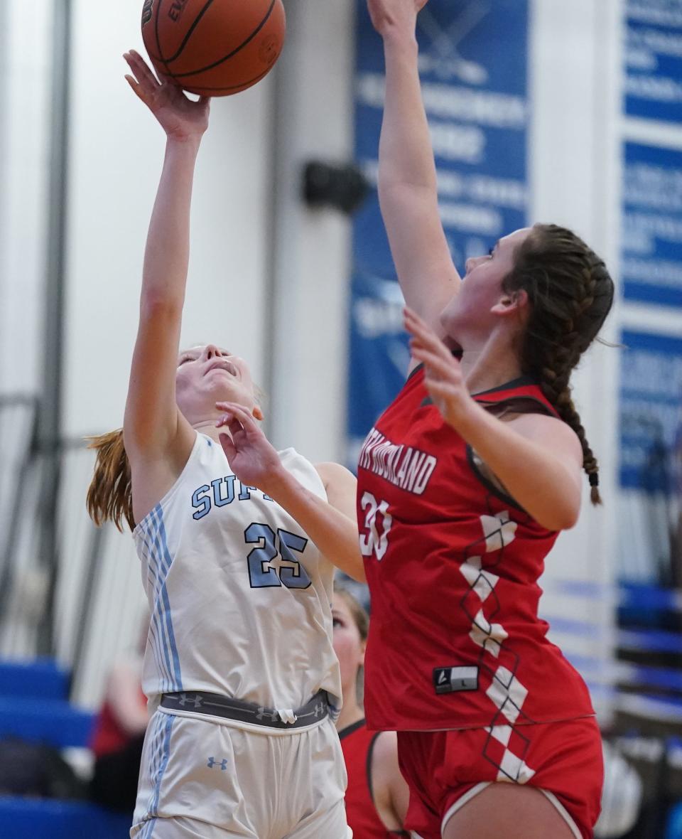 Suffern's Ava Letizia (25) puts up a shot against North Rockland's Kiki Daly (30) during girls basketball action at Suffern High School on Thursday, Jan. 11, 2024. North Rockland won 53-47.