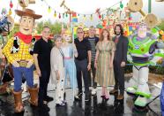 Ahead of <em>Toy Story 4</em>'s release, Tom Hanks, Annie Potts, Tim Allen, Tony Hale, Christina Hendricks and Keanu Reeves visit Toy Story Land at Disney's Hollywood Studios in Orlando, Florida, on Saturday.