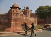 Indian security forces patrol at the historic Red Fort monument the day after it was stormed by protesting farmers in New Delhi, India, Wednesday, Jan.27, 2021. The protestors who have been demanding the repeal of new agricultural laws briefly took over the 17th-century fort on India's Republic Day, and hoisted a Sikh religious flag, in a profoundly symbolic challenge to Prime Minister Narendra Modi's Hindu-nationalist government. (AP Photo/Manish Swarup)