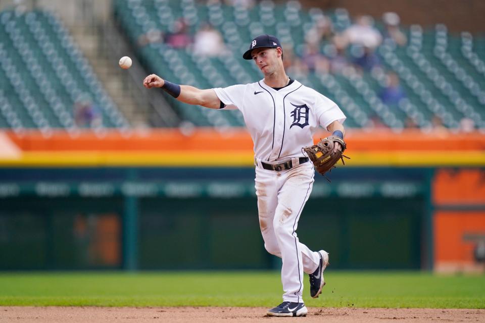 Detroit Tigers shortstop Zack Short throws to first during the fourth inning of the first baseball game of a doubleheader against the Minnesota Twins, Saturday, July 17, 2021, in Detroit. (AP Photo/Carlos Osorio)