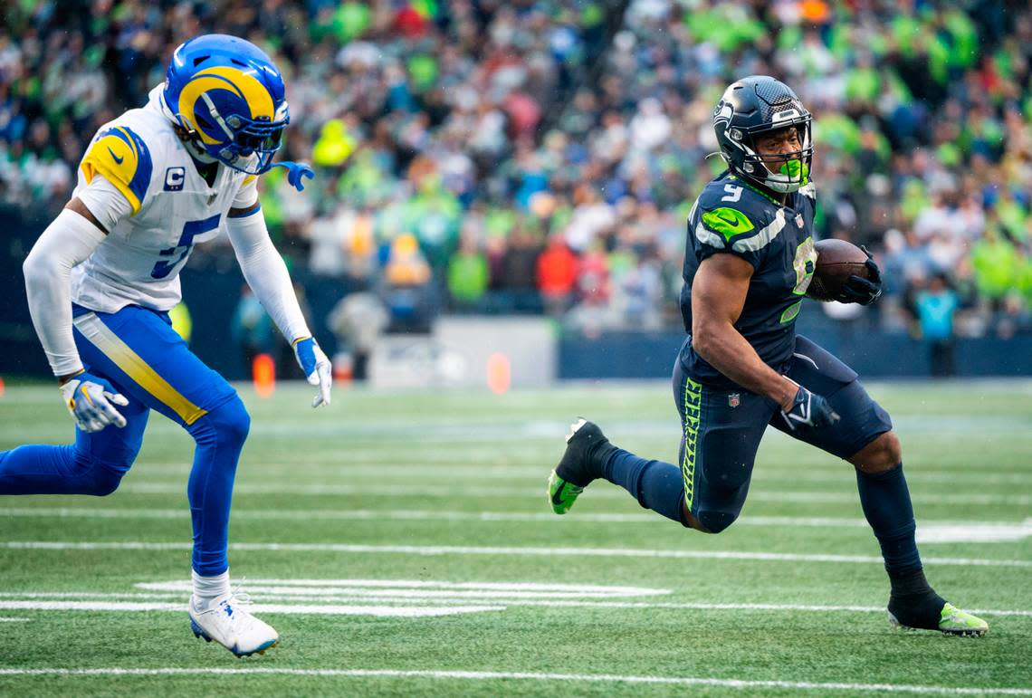 Seattle Seahawks running back Kenneth Walker III (9) runs down the field with the ball in the fourth quarter of an NFL game against the Los Angeles Rams at Lumen Field in Seattle, Wash. on Jan. 8, 2023. The Seahawks defeated the Rams in overtime 19-16.