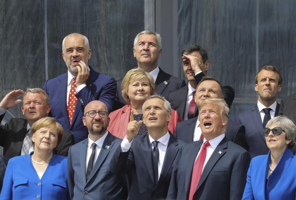 <p>From bottom row left: German Chancellor Angela Merkel, Belgian Prime Minister Charles Michel, NATO Secretary-General Jens Stoltenberg, U.S. President Trump, British Prime Minister Theresa May; second row from the left: Danish Prime Minister Lars Lokke Rasmussen, Norwegian Prime Minister Erna Solberg, Polish President Andrzej Duda, French President Emmanuel Macron; third row from left, Albanian Prime Minister Edi Rama, Czech Republic President Milos Zeman and Spanish Prime Minister Pedro Sanchez. The world leaders poses for a group picture ahead of the opening ceremony of the NATO summit in Brussels on July 11, 2018. (Photo: Ludovic Marin, pool via AP) </p>