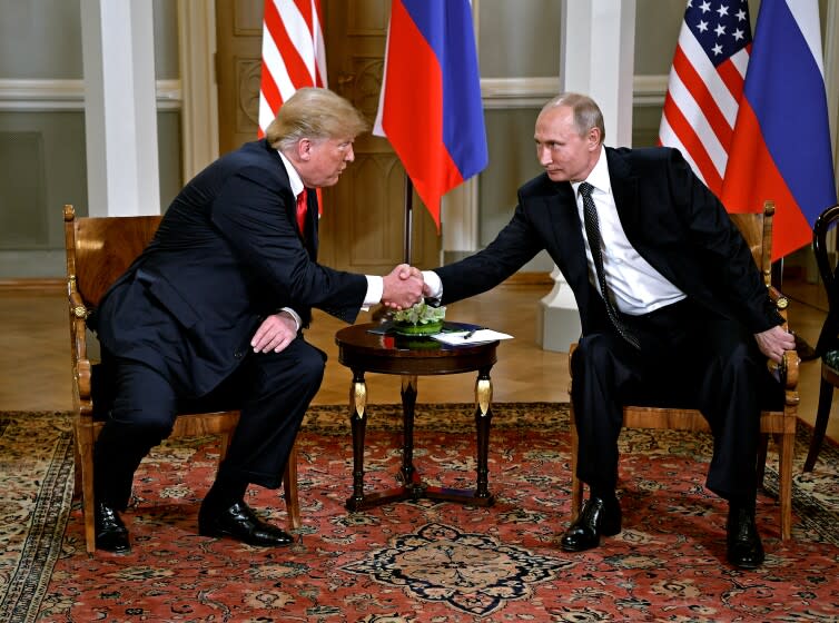 US President Donald Trump shakes hands with Russia's President Vladimir Putin (R) during a meeting in Helsinki, on July 16, 2018. (Photo by Alexey NIKOLSKY / Sputnik / AFP) (Photo credit should read ALEXEY NIKOLSKY/AFP/Getty Images)