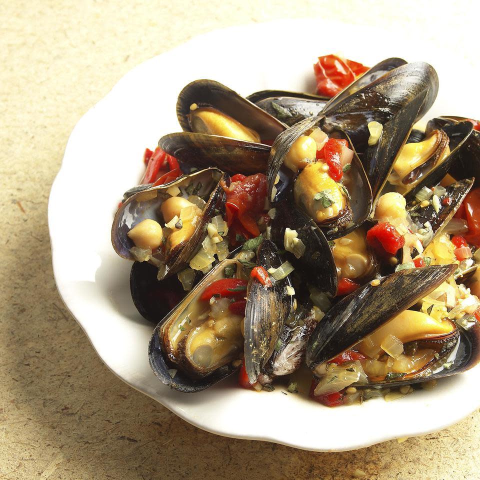 <p>When you think "mussels" you may not instantly think "chickpeas," but the two are joined in tasteful union in this delicious, bistro-style dish. You'll want some crusty bread to sop up the sauce.</p>