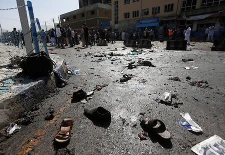 The shoes of victims are seen at the site of blast in Kabul, Afghanistan July 23, 2016. REUTERS/Omar Sobhani