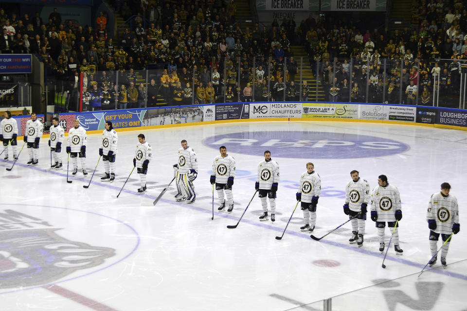 Nottingham Panthers players wearing number 47, Adam Johnson's number, pay tribute before the Ice Hockey Adam Johnson memorial game between Nottingham Panthers and Manchester Storm at the Motorpoint Arena, Nottingham, England, Saturday, Nov. 18, 2023. The memorial game is held three weeks after Adam Johnson, 29, suffered a fatal cut to his neck during a game against Sheffield Steelers on Saturday, October 28. (AP Photo/Rui Vieira)