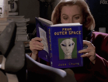 Sully from "The X Files" reading a book