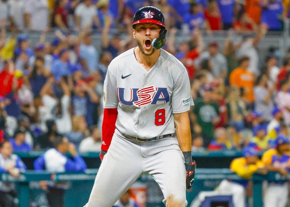 USA’s Trea Turner (8) reacts after hitting a grand slam (2) to left field. Tim Anderson scores, Bobby Witt Jr., and J.T. Realmuto score in the eighth inning during the game against Venezuela at the World Baseball Classic quarterfinal at loanDepot Park in Miami on Saturday, March 18, 2023.