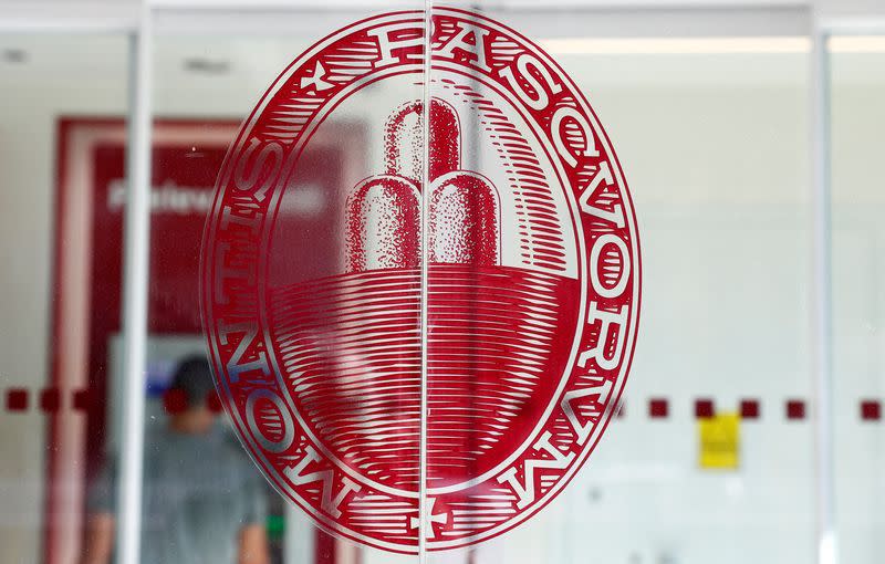 FILE PHOTO: The logo of Monte dei Paschi di Siena bank is seen at a bank entrance in Rome