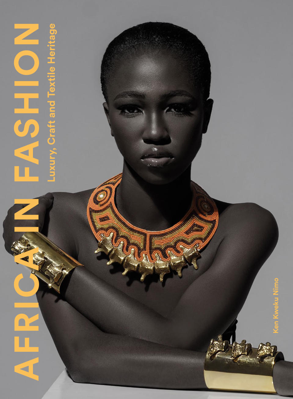 This photo shows the cover of “Africa in Fashion” by Ken Kweku Nimo. (Laurence King Publishing via AP)