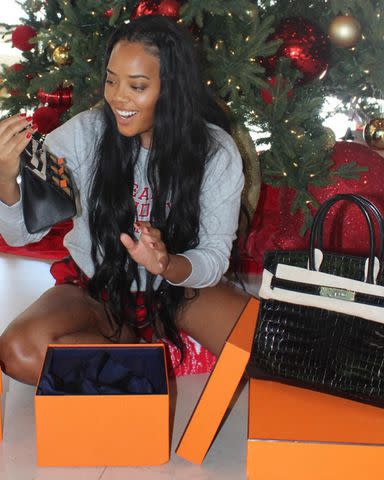 <p><a href="https://www.instagram.com/frankyraw/" data-component="link" data-source="inlineLink" data-type="externalLink" data-ordinal="1">@frankyraw</a></p> Angela Simmons unboxes her Christmas present from Yo Gotti.