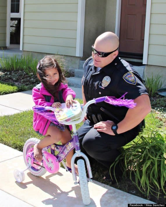 When a little girl's Minnie Mouse bike in Oxnard, Calif., was reported stolen, Officer Michael Kohr showed up the very next day with a brand new one. The girl's mother posted a photo on Facebook of the two together, along with this cheerful thank you:  "Yesterday morning on my way to take my daughter Bella on a bike ride, to our dismay we realized her cherished Minnie Mouse bike that Santa brought her had been stolen, along with our jogging stroller... This afternoon I received a call from Officer Kohr that he was on his way with a brand new Princess bike. He not only surprised her with a bike that is her favorite color featuring her favorite princess he took the time to teach her how to ride it. This is kindness and selflessness at its finest. This officer went well above his call of duty and took the time to make a little girls day. I can not fully express how grateful I am. He has left such an impression in our hearts, and am thoroughly impressed with his generosity. Thank you once again Officer Kohr."