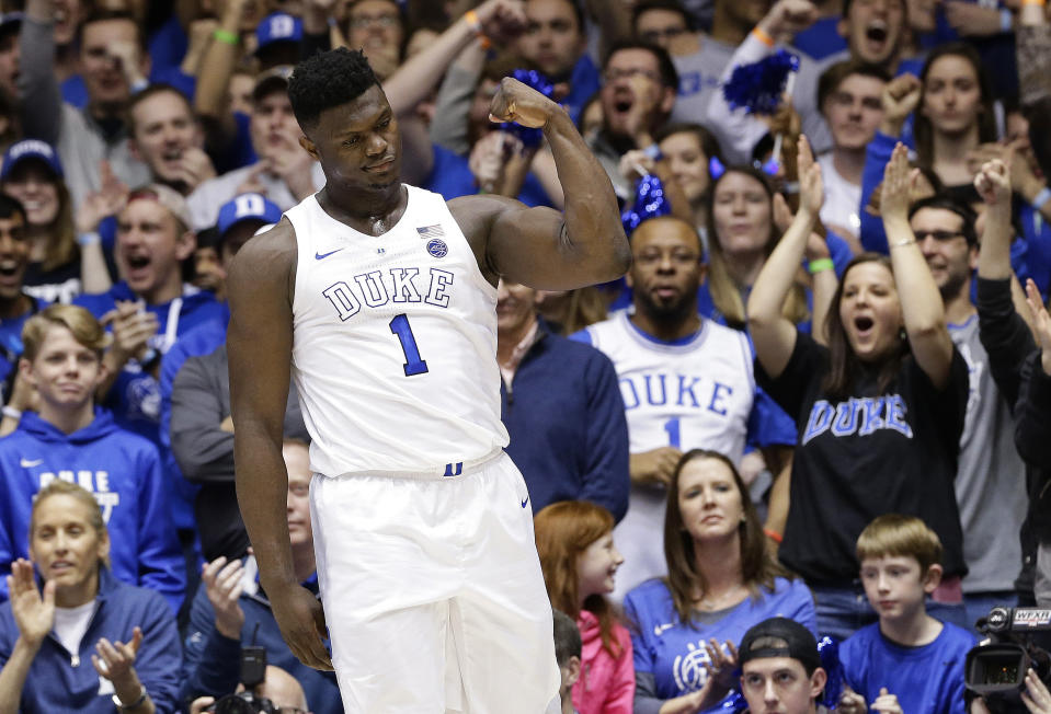 Duke's Zion Williamson (1) reacts following a basket against Virginia during the first half of an NCAA college basketball game in Durham, N.C., Saturday, Jan. 19, 2019. (AP Photo/Gerry Broome)