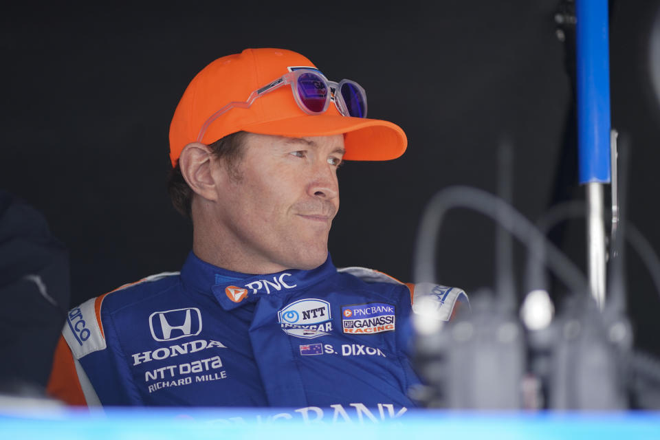 Scott Dixon, of New Zealand, sits in his pit box during practice for the Indianapolis 500 auto race at Indianapolis Motor Speedway, Sunday, May 22, 2022, in Indianapolis. (AP Photo/Darron Cummings)