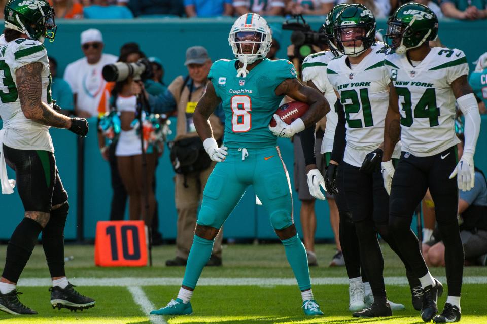 Miami Dolphins safety Jevon Holland (8) reacts after receiving a fair catch in the fourth quarter during the football game between the New York Jets and host Miami Dolphins at Hard Rock Stadium on Sunday, January 8, 2023, in Miami Gardens, FL.