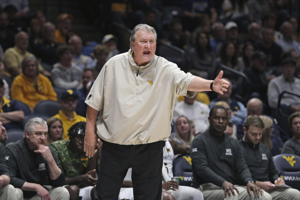 West Virginia coach Bob Huggins reacts during the first half of the team's NCAA college basketball game against Navy in Morgantown, W.Va., Wednesday, Dec. 7, 2022. (AP Photo/Kathleen Batten)